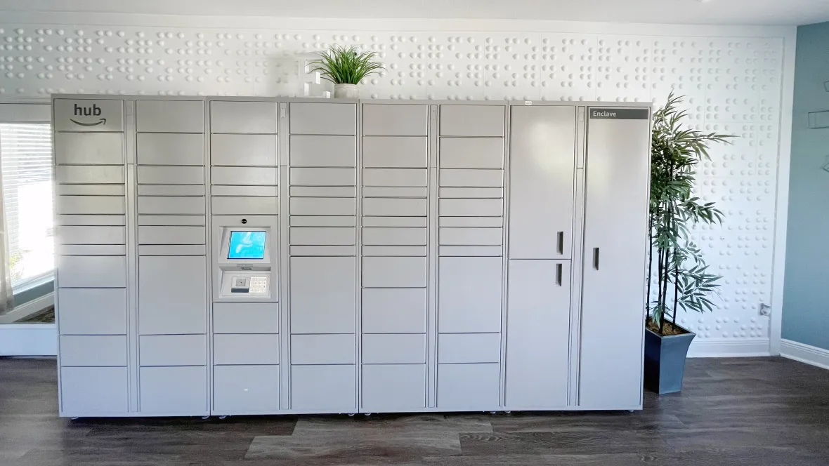 Package lockers in a beautifully adorned indoor area, ensuring a welcoming environment for hassle-free package collection.