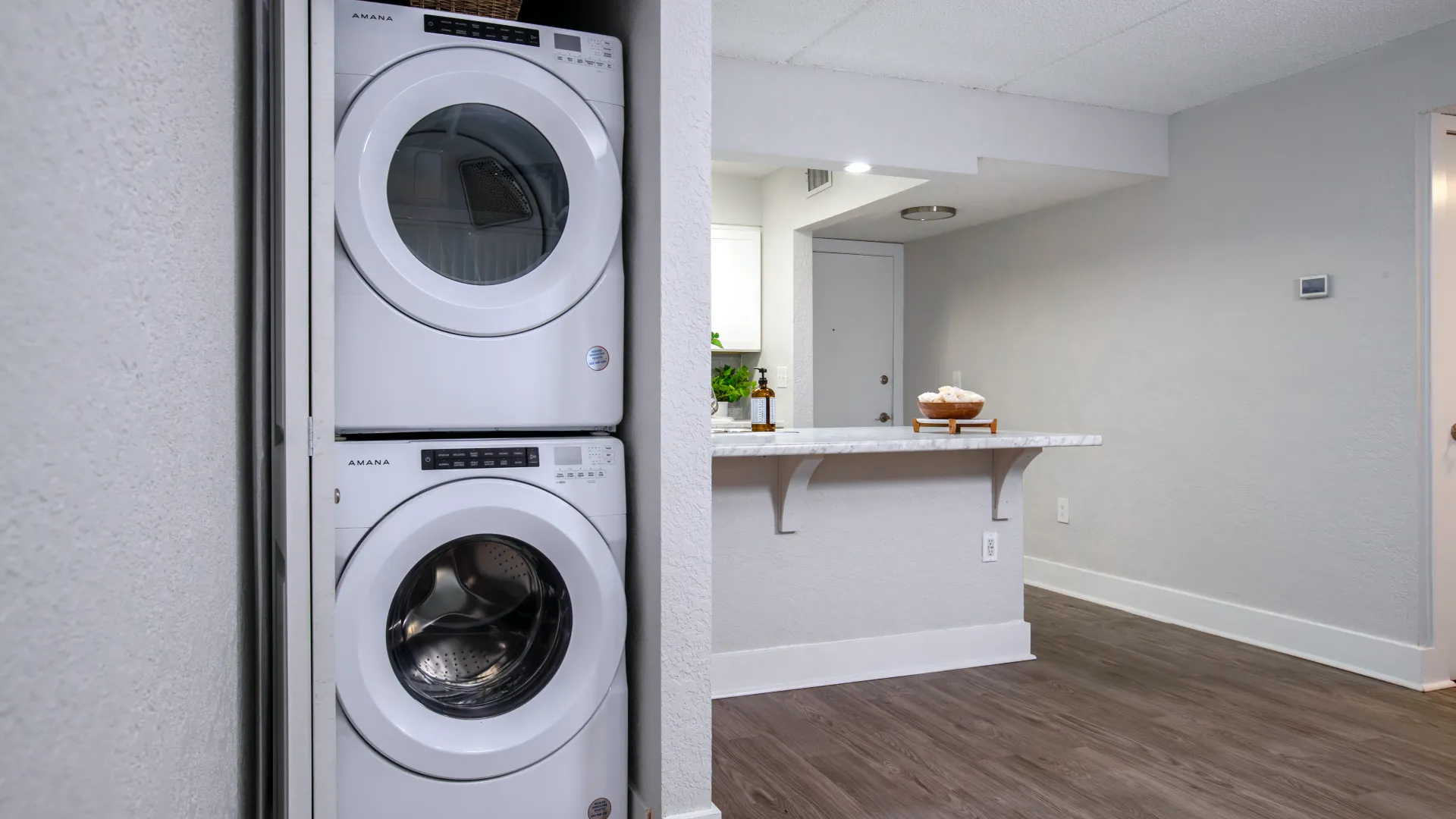 Stackable in-unit washer and dryer in an apartment offering convenience and efficiency for residents.