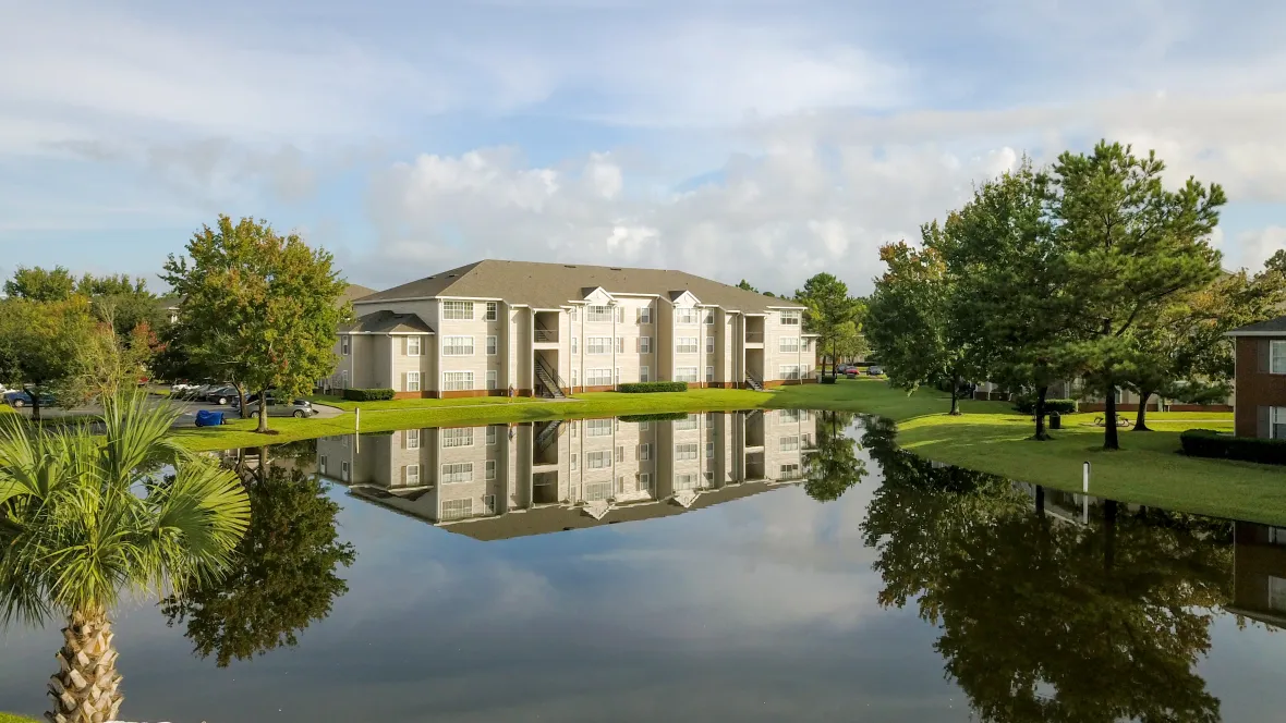 An aerial glimpse of Eagle's Pointe, where nature's beauty meets luxury living by the tranquil lake. A perfect blend of serenity and sophistication.