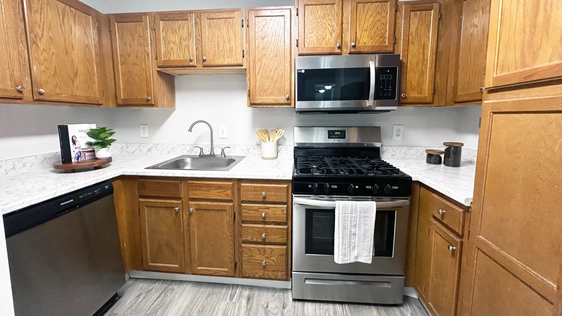 A kitchen fully equipped with stainless steel appliances