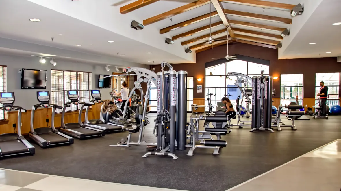 A well-equipped 24-hour fitness center with modern exercise equipment.