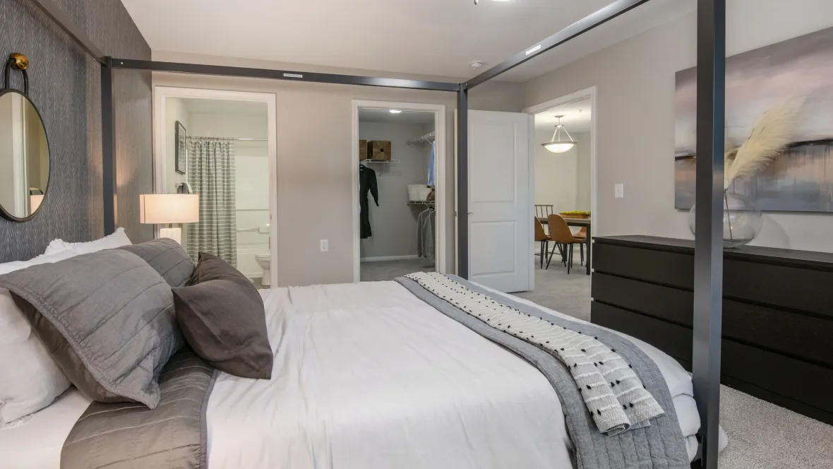 An oversized master bedroom, leading to an ensuite bathroom