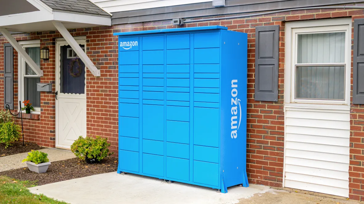 Blue Amazon Hub package lockers allowing residents to retrieve their packages at their own convenience.