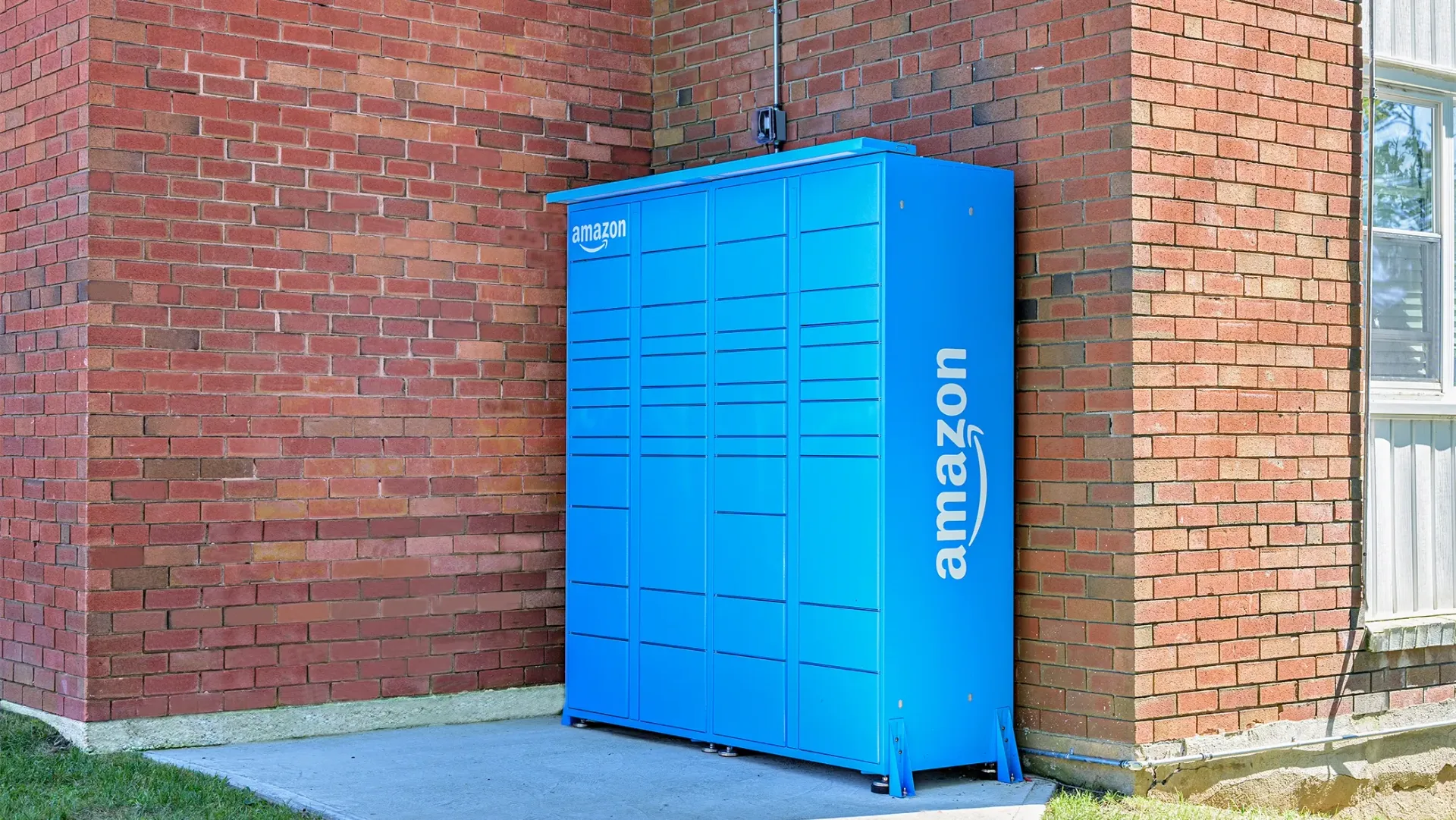 A bright blue package locker for 24/7 package retrieval 