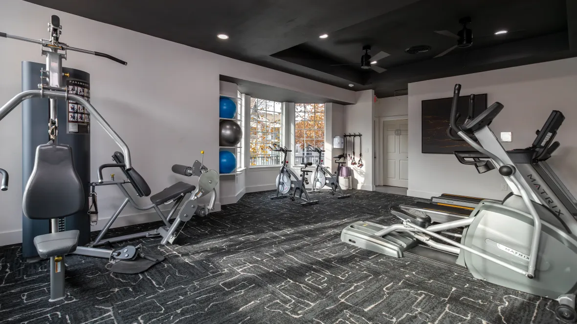 A fully equipped gym offering versatile strength-training and cardio machines to inspire workouts just steps from your front door.  