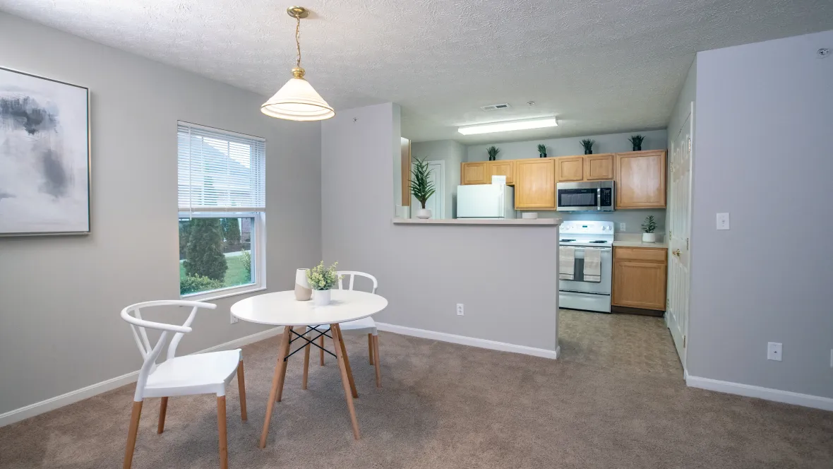The expansive breakfast bar effortlessly connects the kitchen and dining room, creating a space that's both convenient and inviting.