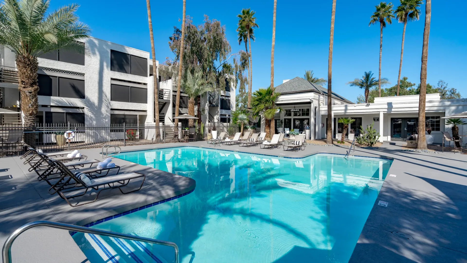 A sparkling pool that beckons you to take a refreshing dip.